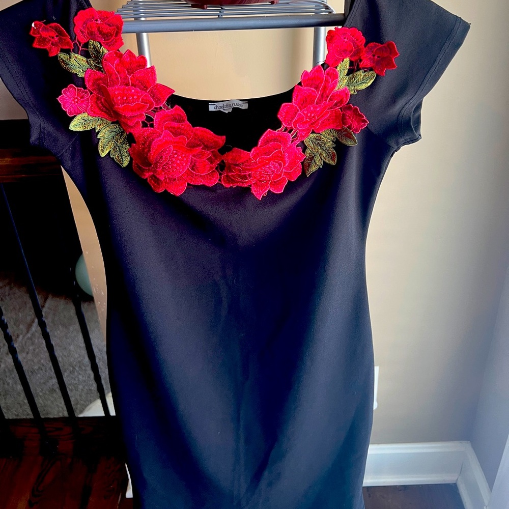 Little black dress with neckline embellishment